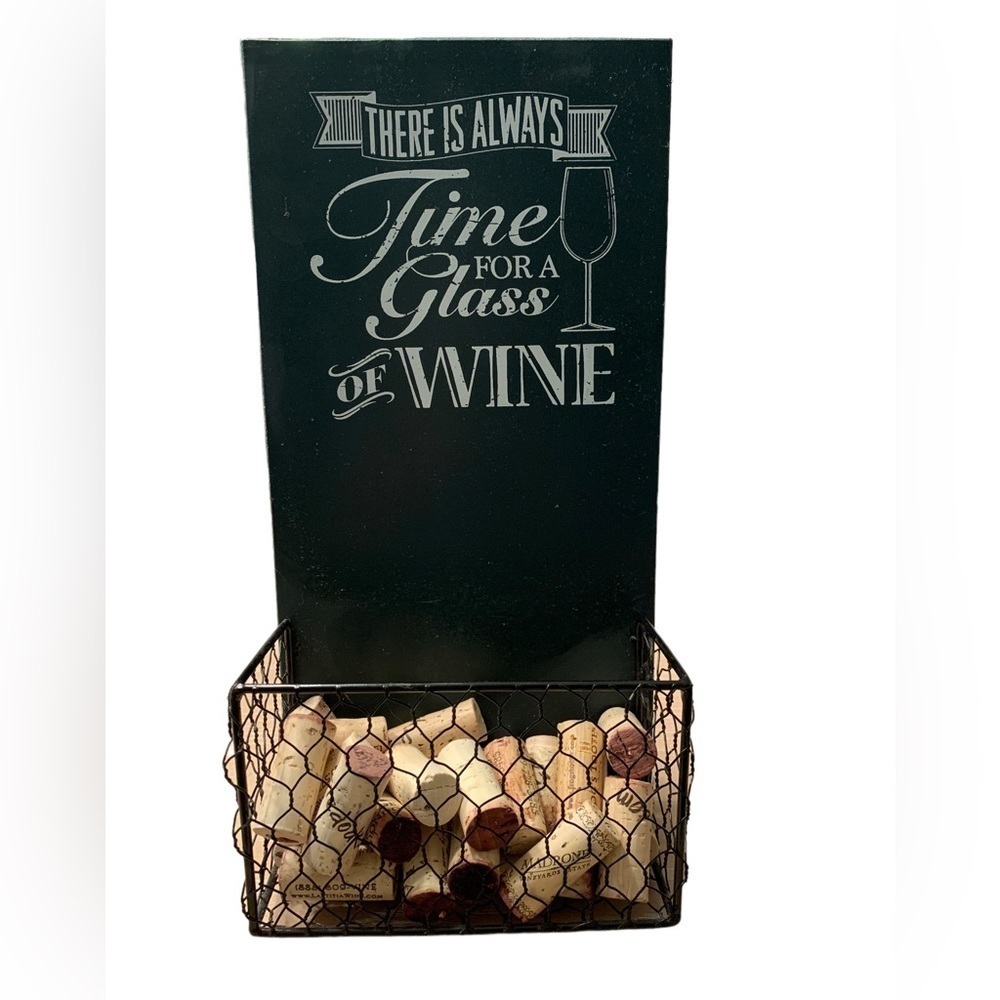 Wine cork wall decor, painted letters show some wear